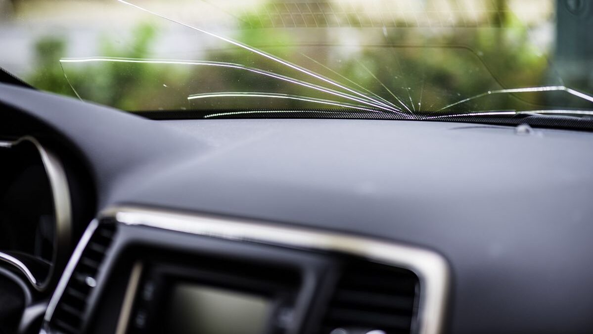 Close-up of Windshield Chip Repair Prosper TX showing resin filling a damaged windshield chip.